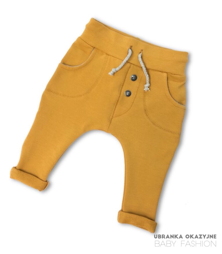 Spodnie musztardowe z dzianiny dla niemowlaka.