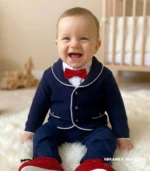 Elegancki granatowy sweterek wizytowy dla niemowlaka, idealny na chrzest, wesele lub roczek