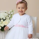 Eleganckie bolerko niemowlęce na chrzest lub roczek, kolor biały, długi rękaw.
