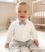 Biały elegancki sweterek niemowlęcy dla chłopca do chrztu i na roczek